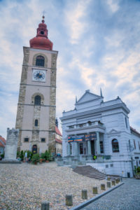 Ptuj (Pettau), St. George Parrish Church bell tower and the City Theatre, Slovenian Styria, Slovenia Ptuj (Pettau), St. George Parrish Church bell tower and the City Theatre, Slovenian Styria, Slovenia